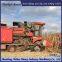 Corn harvester modified with half chain track anti sinking half track