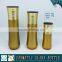 Gold yellow coloured cosmetic glass bottle and cosmetic glass cream jar
