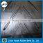 Industrial large angle patterned ribbed chevron conveyor belt