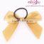 grosgrain ribbon bow on wine bottle