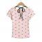 French-style casual T-shirt with floral lace trim and bow detailing, featuring a strapless design and short sleeves.