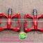 Red color mountain racing bike pedals