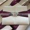 Silk Wedding Invitation with custom brooch closure and foil printed invitations with burgundy ribbon