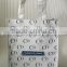 sturdy white woven tote bag with custom printed logo for shopping