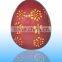 Ceramic red egg shape luminary with inner led candle for bedroom, indoor decoration