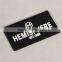 Black-white silicon plastic tag with prominent letters logo for leather gloves