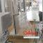 Bag Uncuffer and Top Roller Machine