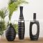Factory direct wholesale cheap custom home decoration black matte resin vase for flowers