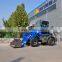 good condition small front loader with attachments