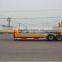 Low loader / low bed truck trailer used to transport crawl equipment