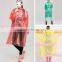 Yellow Waterproof kids raincoat/rain poncho with hood and print