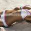 European and American hot sale hook flower swimsuit female black and white lace sexy chest gathered bikini embroidery