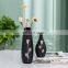 Amazon Hot Selling New Design Chinese Ornament Handmade Ceramic Flower Kneaded Gold Black Vase For Home Decor
