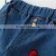 Do the old hole cartoon cow embroidery denim trousers