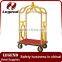 Used hotel luggage cart in bronze plated