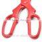 red hand tool engraved scissors
