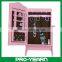 Mini Floor Standing Wooden Furniture Chinese Mirrored Jewelry Cabinet With Wavelike Door Top and LED Lights