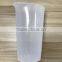 White mini household hand blender with stainless steel blades