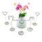 heart shaped wire holder memo clips with spiral wire base for party favors at a wedding reception