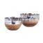 wooden base metal bowl