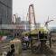 Sludge dewatering centrifuge