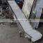 Customized size vertical hopper belt conveyor for discharge finished products.