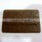 camel color jeans leather label/metal plate in the middle