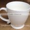 Factory wholesale ceramic white footed shape mugs and cups