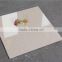 Foshan pink pulati nano double charge technology vitrified floor tiles