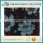 Brown/blue hand carved acrylic a bold floral pattern and stems in natural brown rug for living room