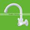 white plastic kitchen water faucet