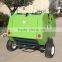 Mini hay baler/tractor with hay baler/farm baler to a walk-behind tractor