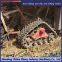 Corn harvester modified with triangular track wheel anti sinking half chain rail