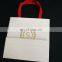Wholesale White paper Jewelry Bag With Foil Gold Logo