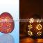 Ceramic red egg shape luminary with inner led candle for bedroom, indoor decoration