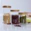 China Supplier Decorative Clear High Borosilicate Bamboo Lid Sealing Glass Storage Container