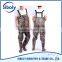 durable cheap waterproof pvc chest high fishing wader being used as aquacultural working wear