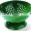 colorful galvanized metal fruit colander
