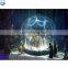 Factory high-quality customized  giant inflatable snow globe bouncy castle for shopping mall christmas decoration