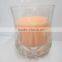 candle in glass jar