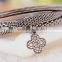Fashion jewelry wholesale China rope zinc alloy rhinestone flower pendant charm bracelet                        
                                                                                Supplier's Choice