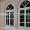 aluminum side hung casement window with half round spoked pediment