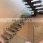 Low cost floating wooden step with light curved staircase