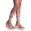 Ladies fancy unique gold color design lace up glitter flat form sandals shoes