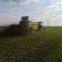Farm tractor trailed horizontal beater manure fertilizer dispenser spreading equipment