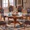 Dining room antique round rotating table with leather chairs