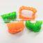 Hot color soft plastic freaky fangs toy