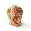 Handmade little boy angel figurine