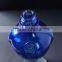 Factory direct export OEM custom design empty clear colored blue beverage kettle 480ml glass fancy liquor wine bottle with logo