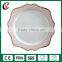 Elegant rimmed gold ceramic charger plate for wedding